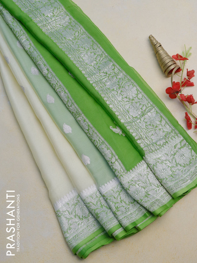 Pure banarasi chiffon silk saree cream and light green with silver zari woven buttas and silver zari woven border