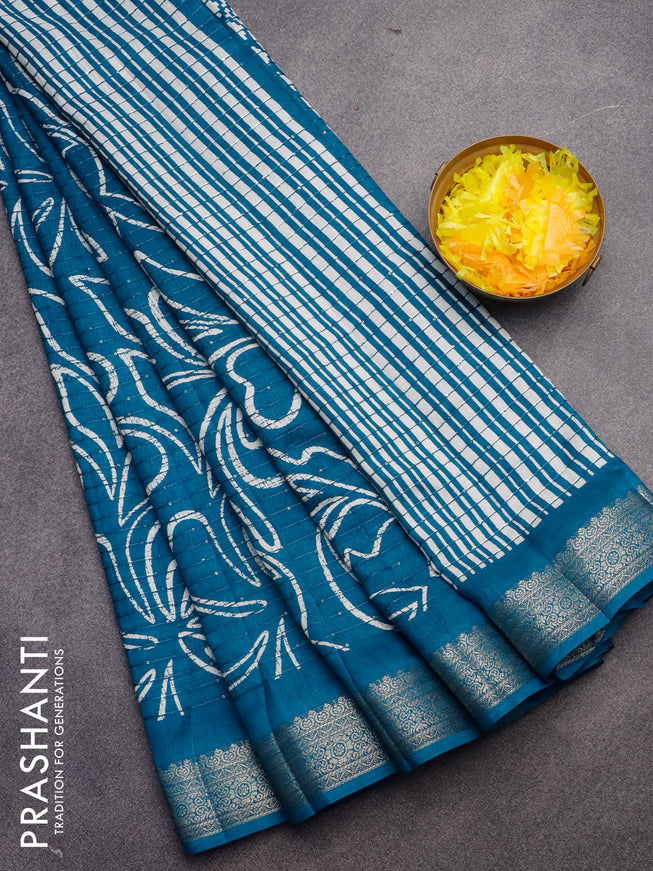 Semi raw silk saree cs blue with allover floral digital prints & sequin work and zari woven border