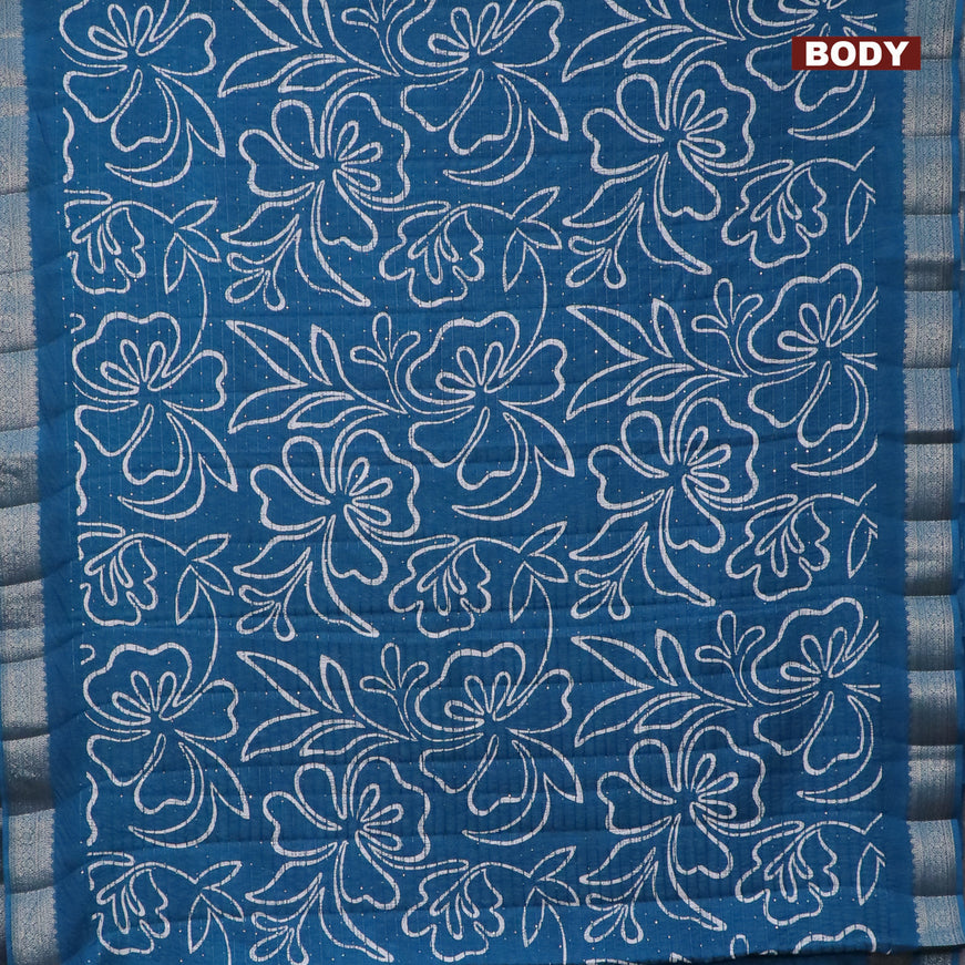 Semi raw silk saree cs blue with allover floral digital prints & sequin work and zari woven border