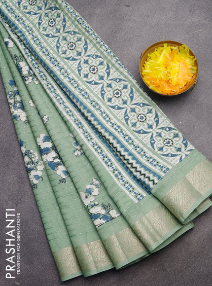 Semi raw silk saree pastel green with allover floral digital prints & sequin work and zari woven border