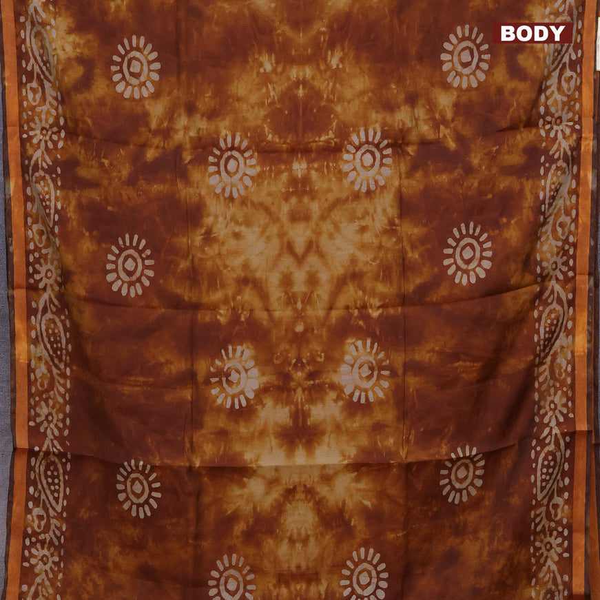 Muslin cotton saree dark mustard with tie and dye & batik butta prints and small zari woven border