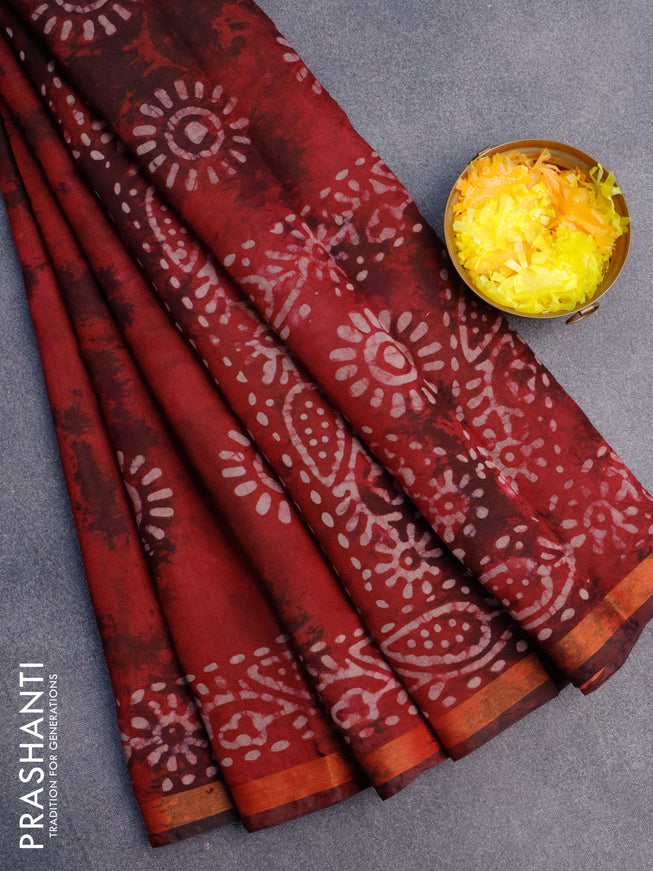 Muslin cotton saree maroon with tie and dye & batik butta prints and small zari woven border