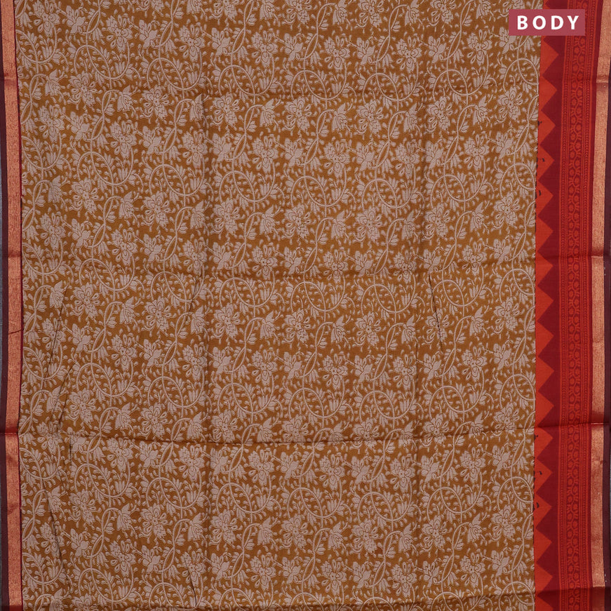 Muslin cotton saree dark mustard and maroon with allover floral prints and small zari woven border