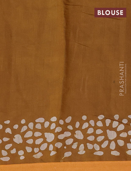 Muslin cotton saree dark mustard with allover batik prints and small zari woven border