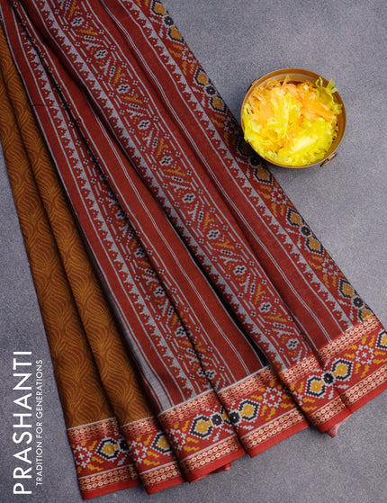 Muslin cotton saree dark mustard and maroon with allover prints and patola printed border