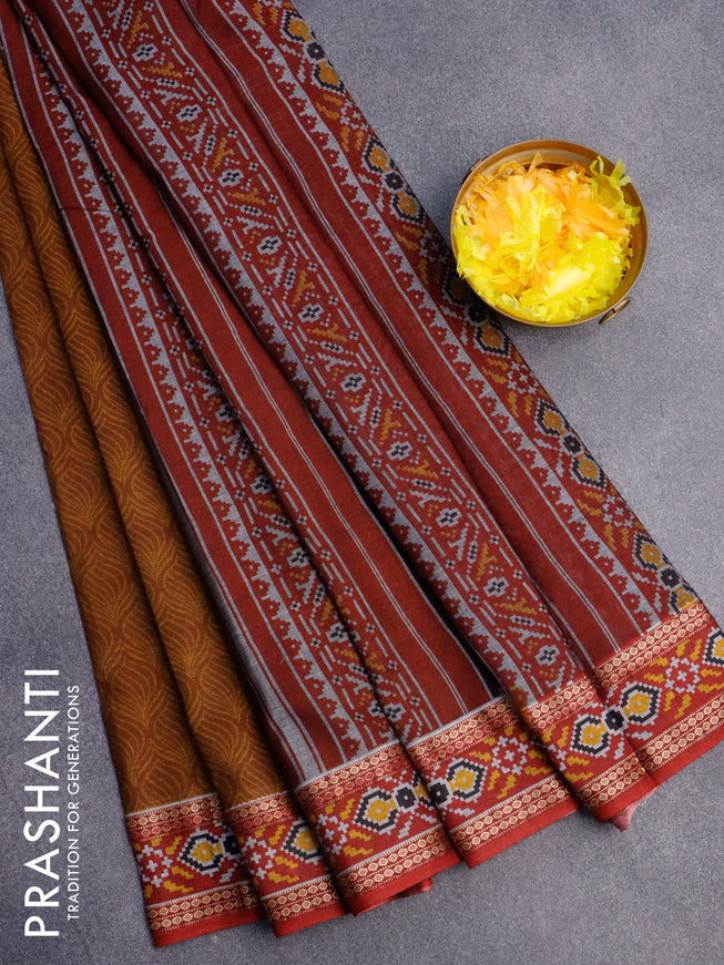 Muslin cotton saree dark mustard and maroon with allover prints and patola printed border