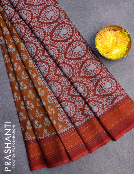 Muslin cotton saree dark mustard and rustic orange maroon with allover butta prints and printed border