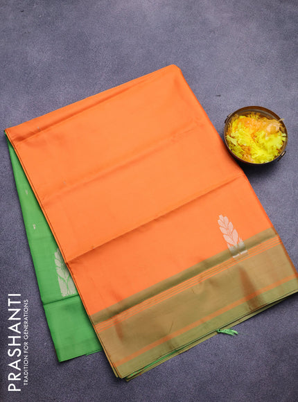 Banana pith saree orange and parrot green with thread woven buttas in borderless style