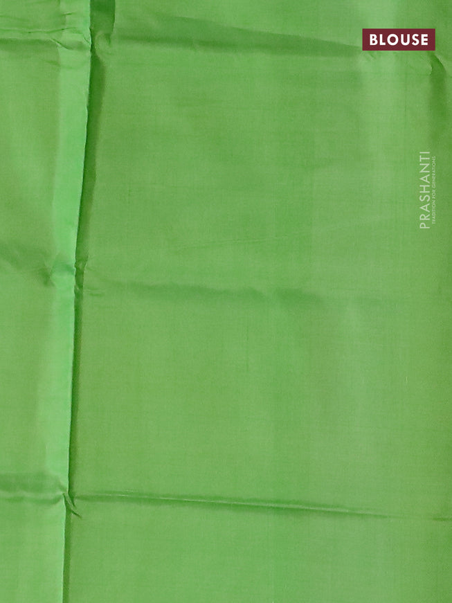 Banana pith saree orange and parrot green with thread woven buttas in borderless style