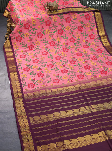 Silk cotton saree peach pink and wine shade with allover floral prints and paisley zari woven korvai border