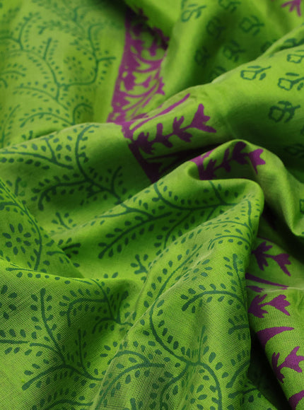 Silk cotton block printed saree light green with allover prints and zari woven border