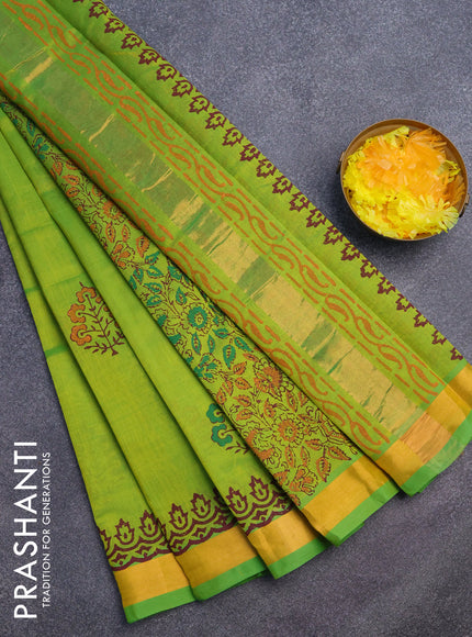 Silk cotton block printed saree light green with floral butta prints and zari woven border