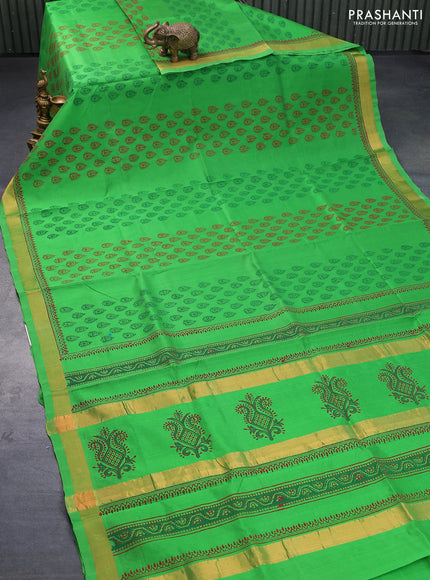 Silk cotton block printed saree light green with butta prints and zari woven border