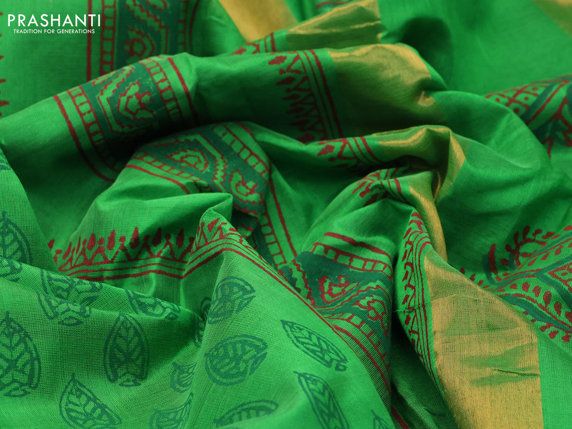 Silk cotton block printed saree light green with butta prints and zari woven border