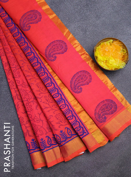 Silk cotton block printed saree dual shade of pinkish orange with allover prints and zari woven border