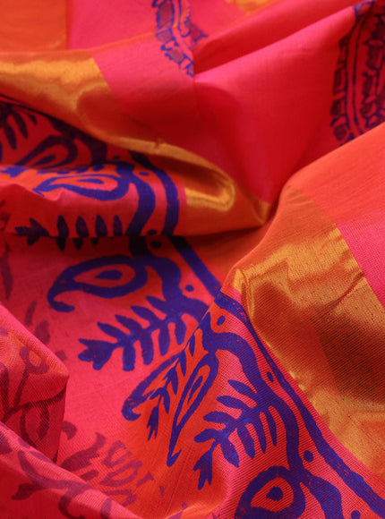 Silk cotton block printed saree dual shade of pinkish orange with allover prints and zari woven border