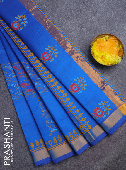 Silk cotton block printed saree cs blue with allover prints and zari woven border