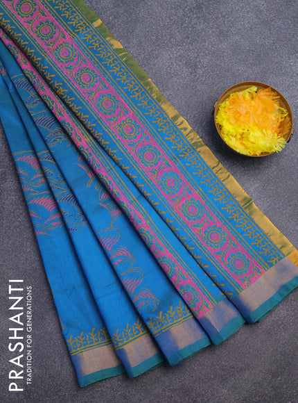 Silk cotton block printed saree dual shade of teal blue with allover prints and zari woven border