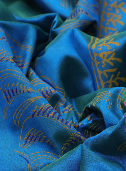 Silk cotton block printed saree dual shade of teal blue with allover prints and zari woven border