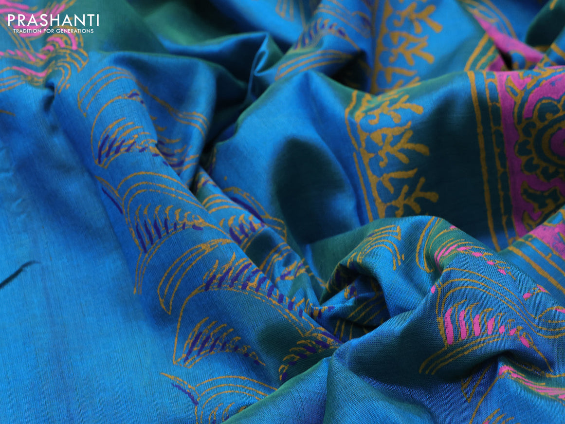 Silk cotton block printed saree dual shade of teal blue with allover prints and zari woven border