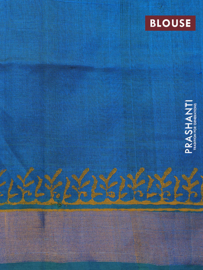 Silk cotton block printed saree dual shade of teal blue with allover prints and zari woven border