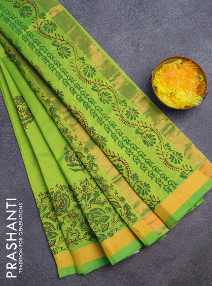 Silk cotton block printed saree light green with floral butta prints and zari woven border