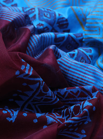 Silk cotton block printed saree maroon and light blue with allover prints and zari woven border