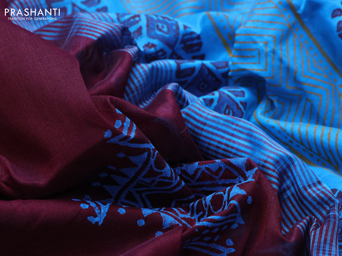 Silk cotton block printed saree maroon and light blue with allover prints and zari woven border