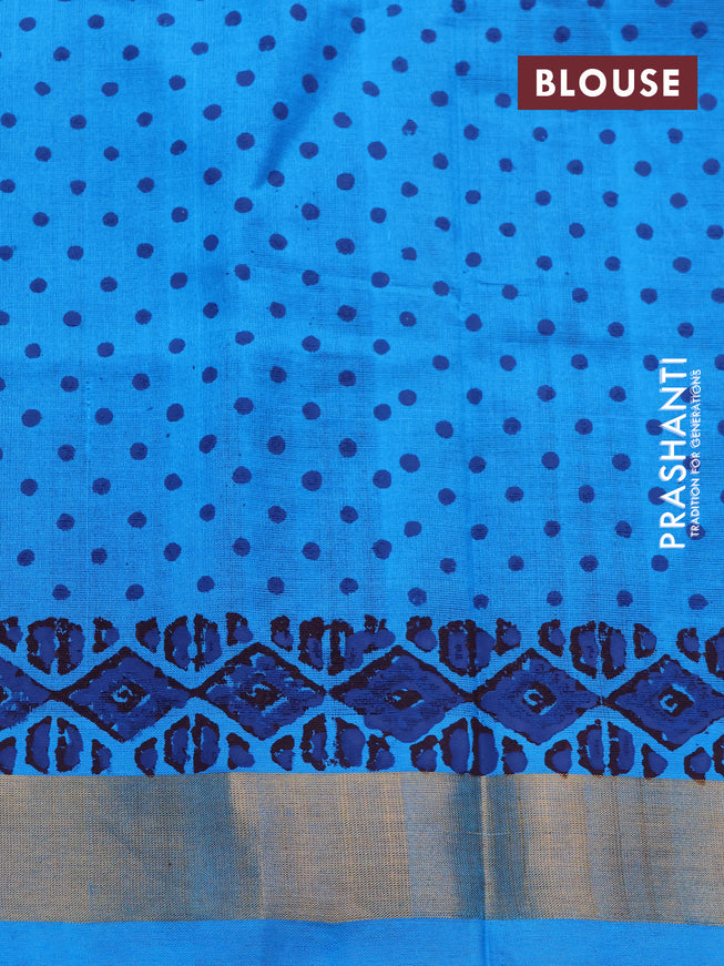 Silk cotton block printed saree maroon and light blue with allover prints and zari woven border