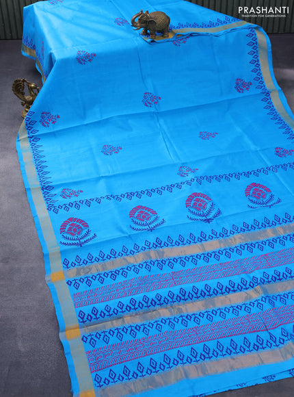 Silk cotton block printed saree cs blue with allover prints and zari woven border