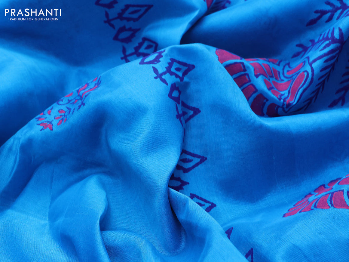 Silk cotton block printed saree cs blue with allover prints and zari woven border