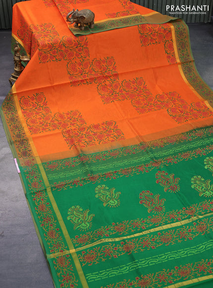 Silk cotton block printed saree orange and green with allover prints and zari woven simple border