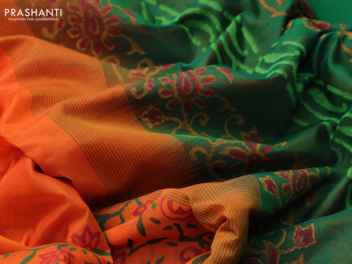 Silk cotton block printed saree orange and green with allover prints and zari woven simple border