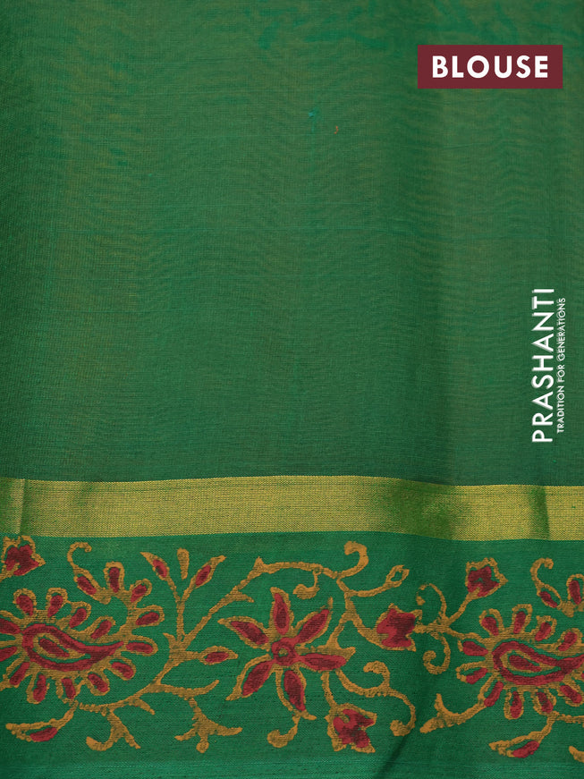 Silk cotton block printed saree orange and green with allover prints and zari woven simple border