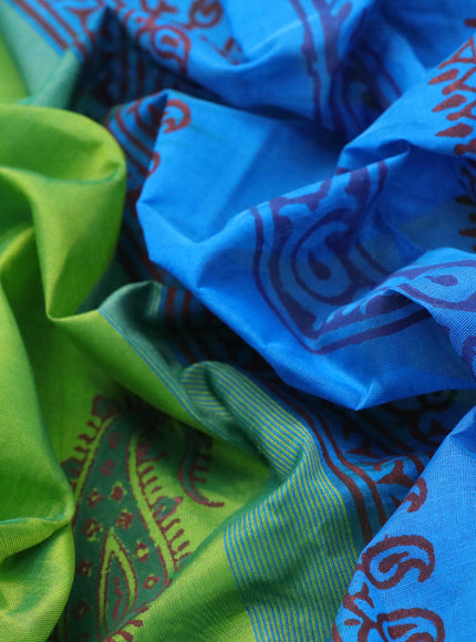 Silk cotton block printed saree green and cs blue with paisley butta prints and zari woven simple border