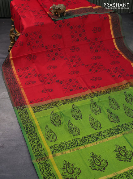 Silk cotton block printed saree red and green with allover floral prints and zari woven simple border