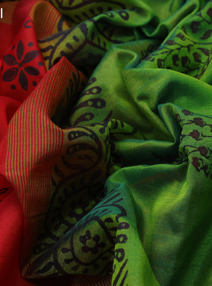 Silk cotton block printed saree red and green with allover floral prints and zari woven simple border