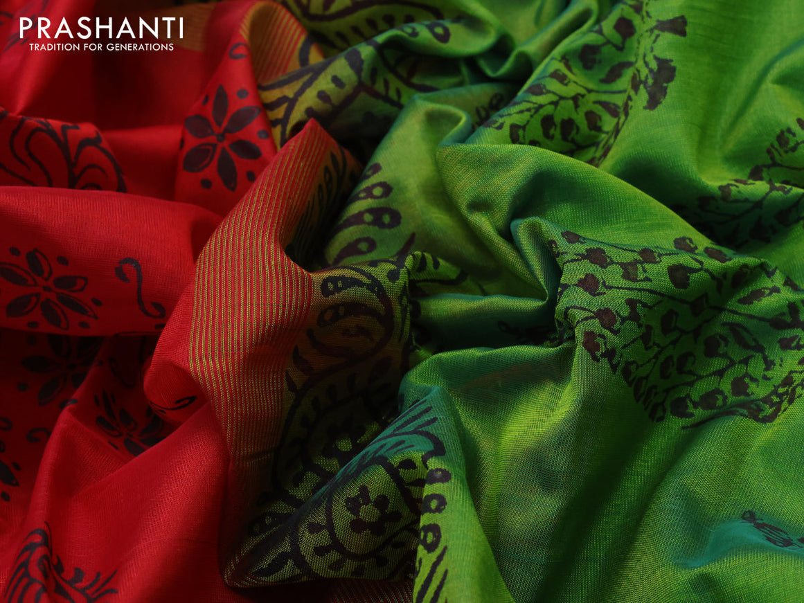 Silk cotton block printed saree red and green with allover floral prints and zari woven simple border