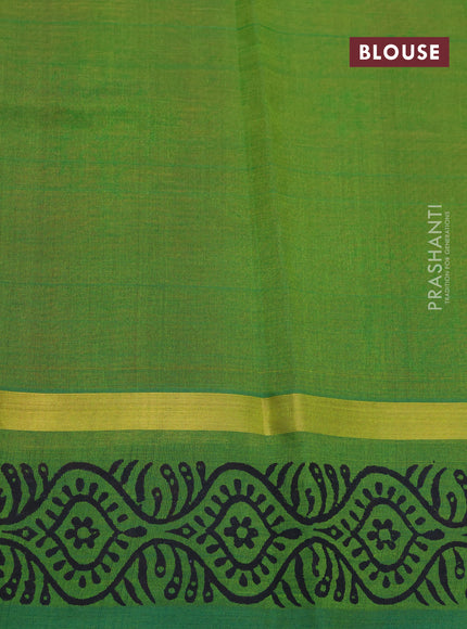 Silk cotton block printed saree red and green with allover floral prints and zari woven simple border