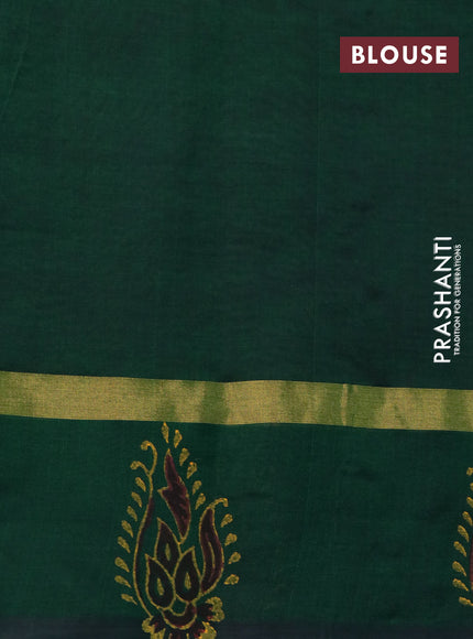 Silk cotton block printed saree grey and green with allover prints and zari woven simple border