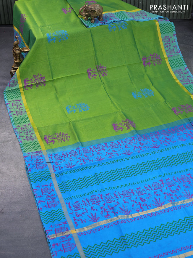 Silk cotton block printed saree green and cs blue with butta prints and zari woven simple border