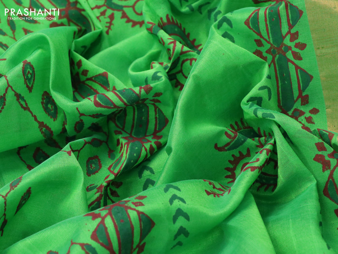 Silk cotton block printed saree green with allover prints and zari woven border