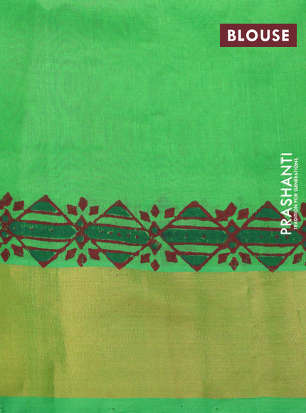 Silk cotton block printed saree green with allover prints and zari woven border