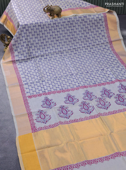 Silk cotton block printed saree pastel grey with allover prints and zari woven border