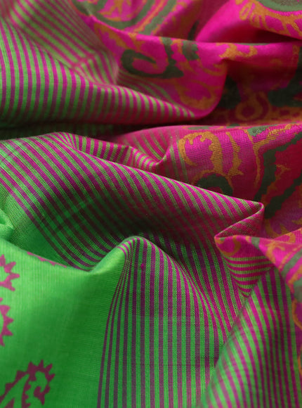 Silk cotton block printed saree parrot green and pink with paisley butta prints and zari woven border