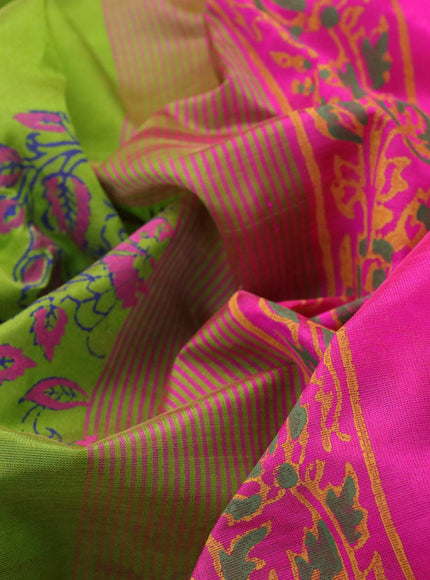 Silk cotton block printed saree light green and pink with allover prints and zari woven border