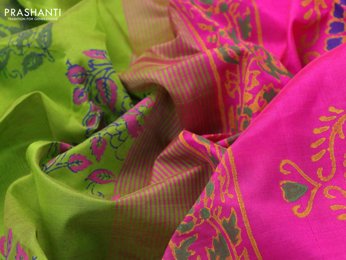 Silk cotton block printed saree light green and pink with allover prints and zari woven border