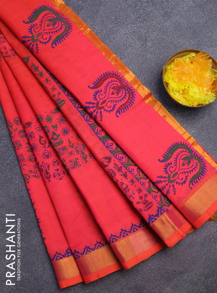 Silk cotton block printed saree dual shade of pinkish orange with allover prints and zari woven border