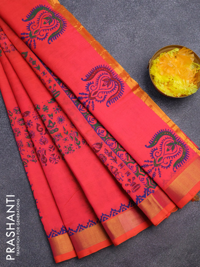 Silk cotton block printed saree dual shade of pinkish orange with allover prints and zari woven border