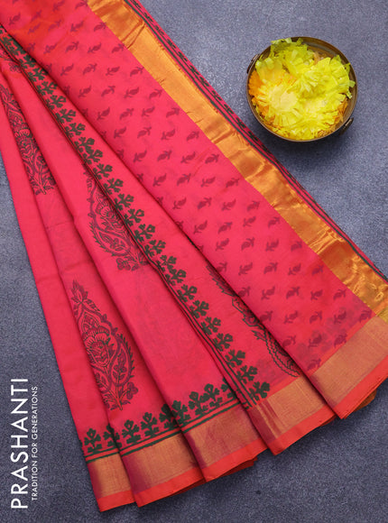 Silk cotton block printed saree dual shade of pinkish orange with butta print and zari woven border